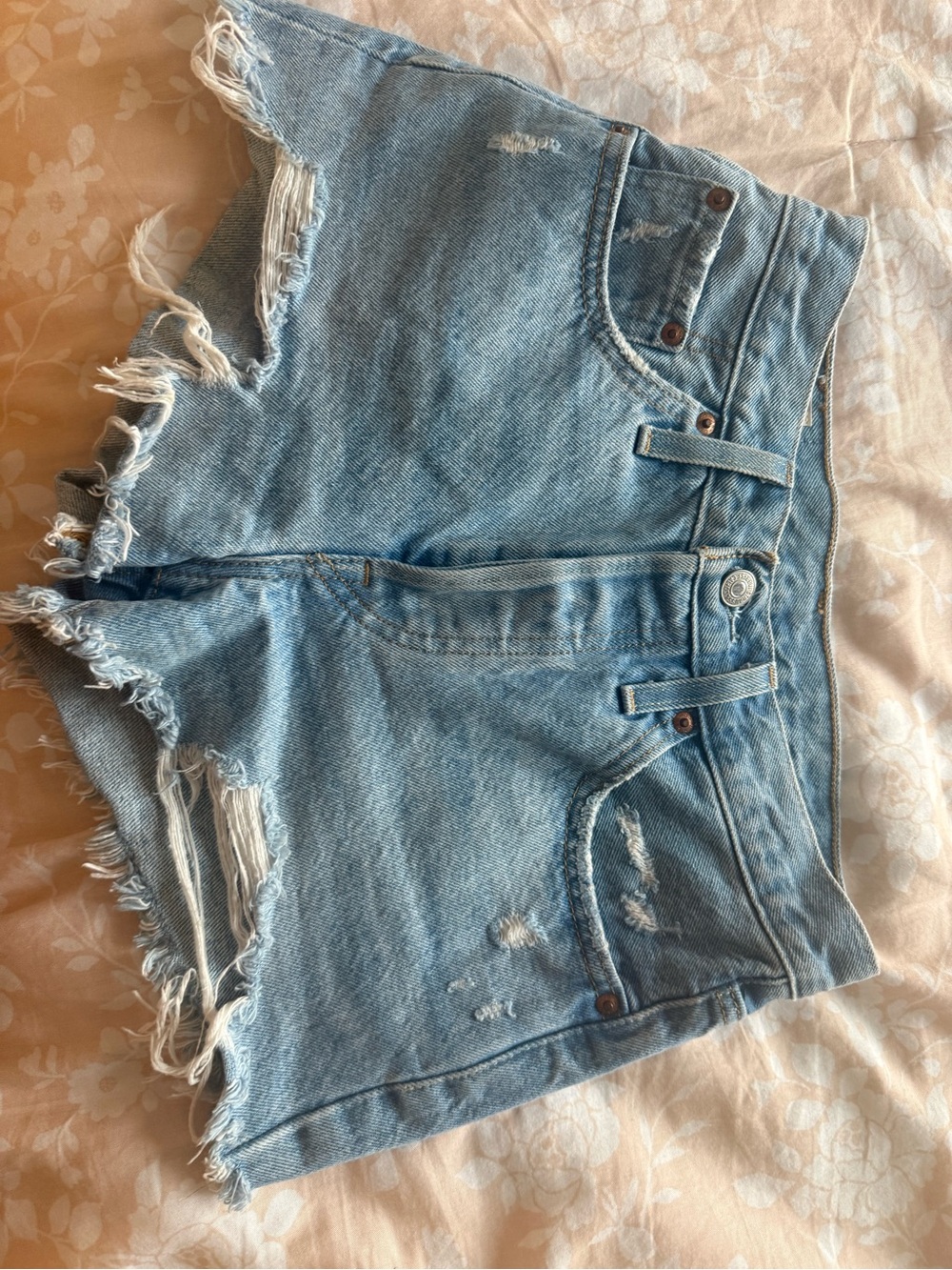 Levi’s Classic Light Blue Distressed Denim Shorts